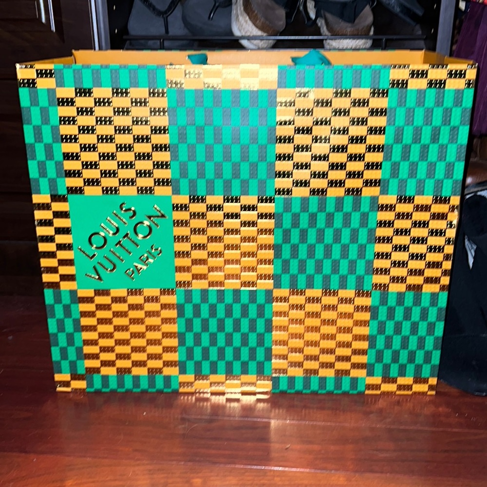 New large Louis Vuitton green Lego shopping bag.